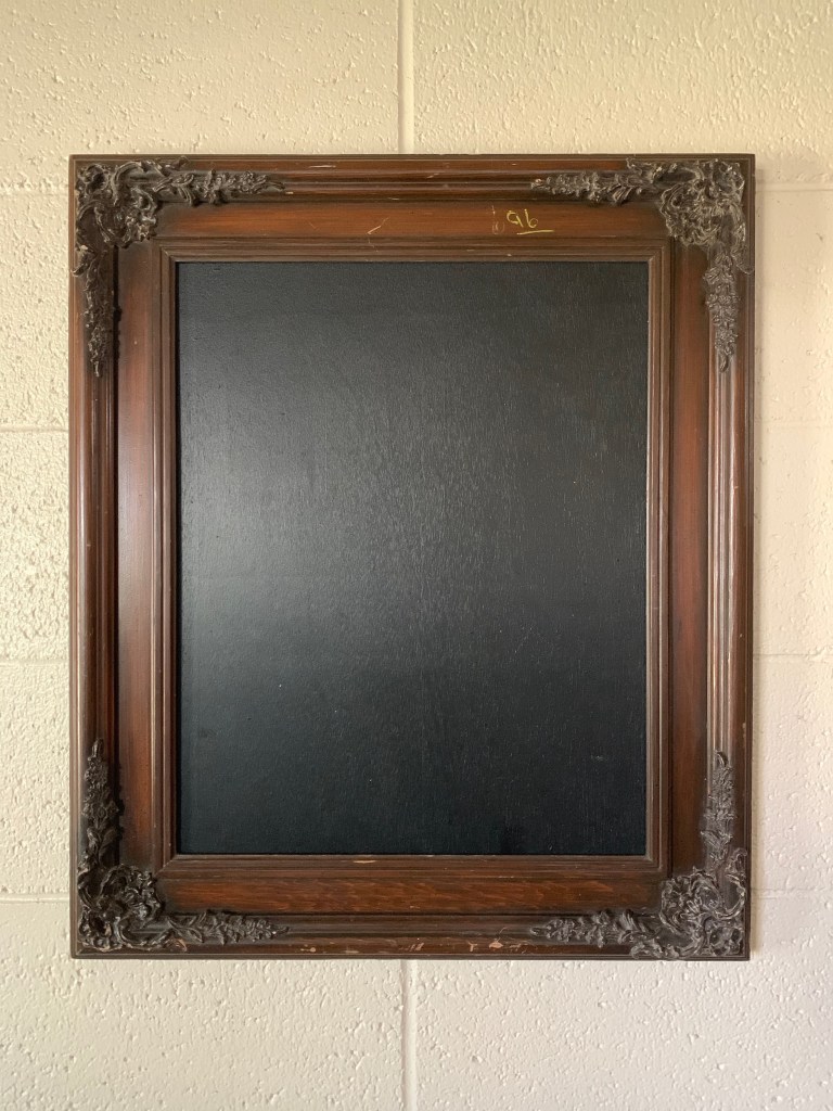 DIY upcycled chalkboard made from vintage wall frame.