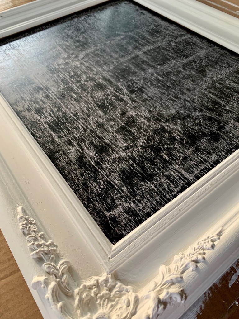 DIY upcycled chalkboard made from vintage wall frame.